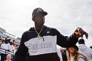 Deion Sanders of the Colorado Buffaloes walks off the field